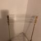 Folding chair in plexiglass and brass