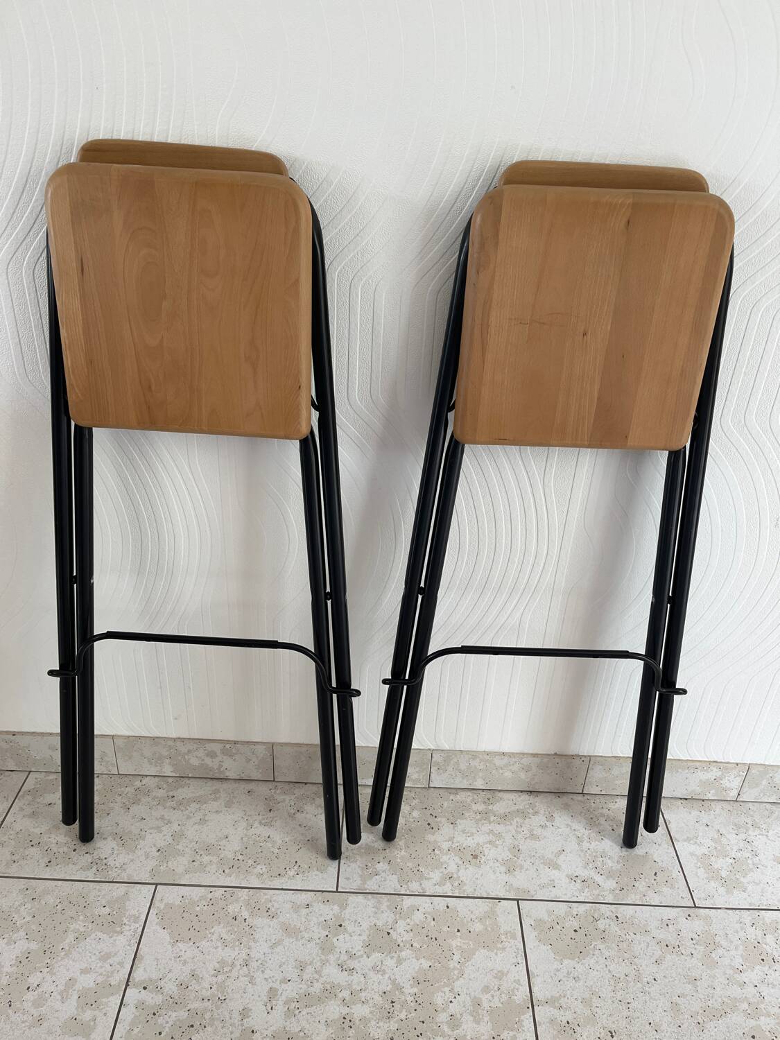2 foldable bar stools from the 90s in wood and black metal