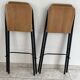 2 foldable bar stools from the 90s in wood and black metal