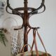 Old wooden parrot coat holder