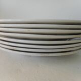 Set of 8 flat plates in Boch earthenware