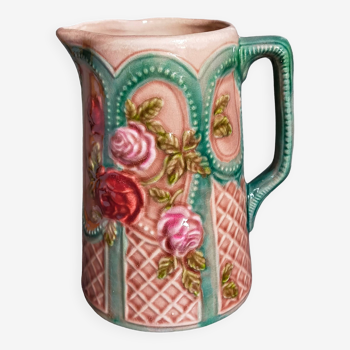 Antique slip pitcher with blooming roses