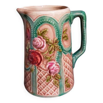 Antique slip pitcher with blooming roses