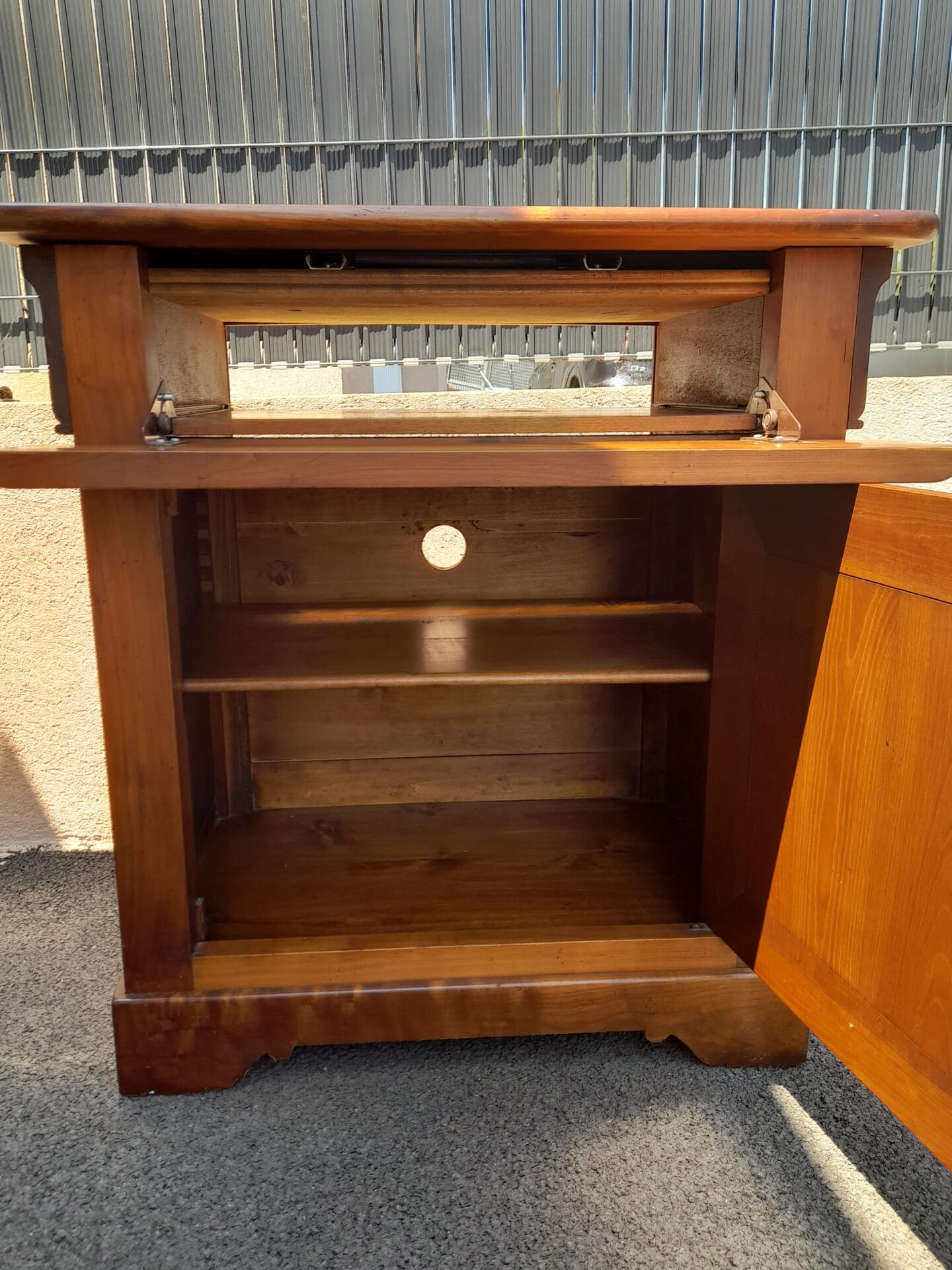 TV unit with rotating shelf