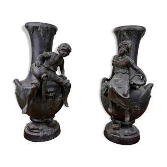 François Moreau: Pair of vases with Napoleon III period characters in regula with bronze patina