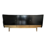 Black buffet cabinet including a bar and 3 drawers.