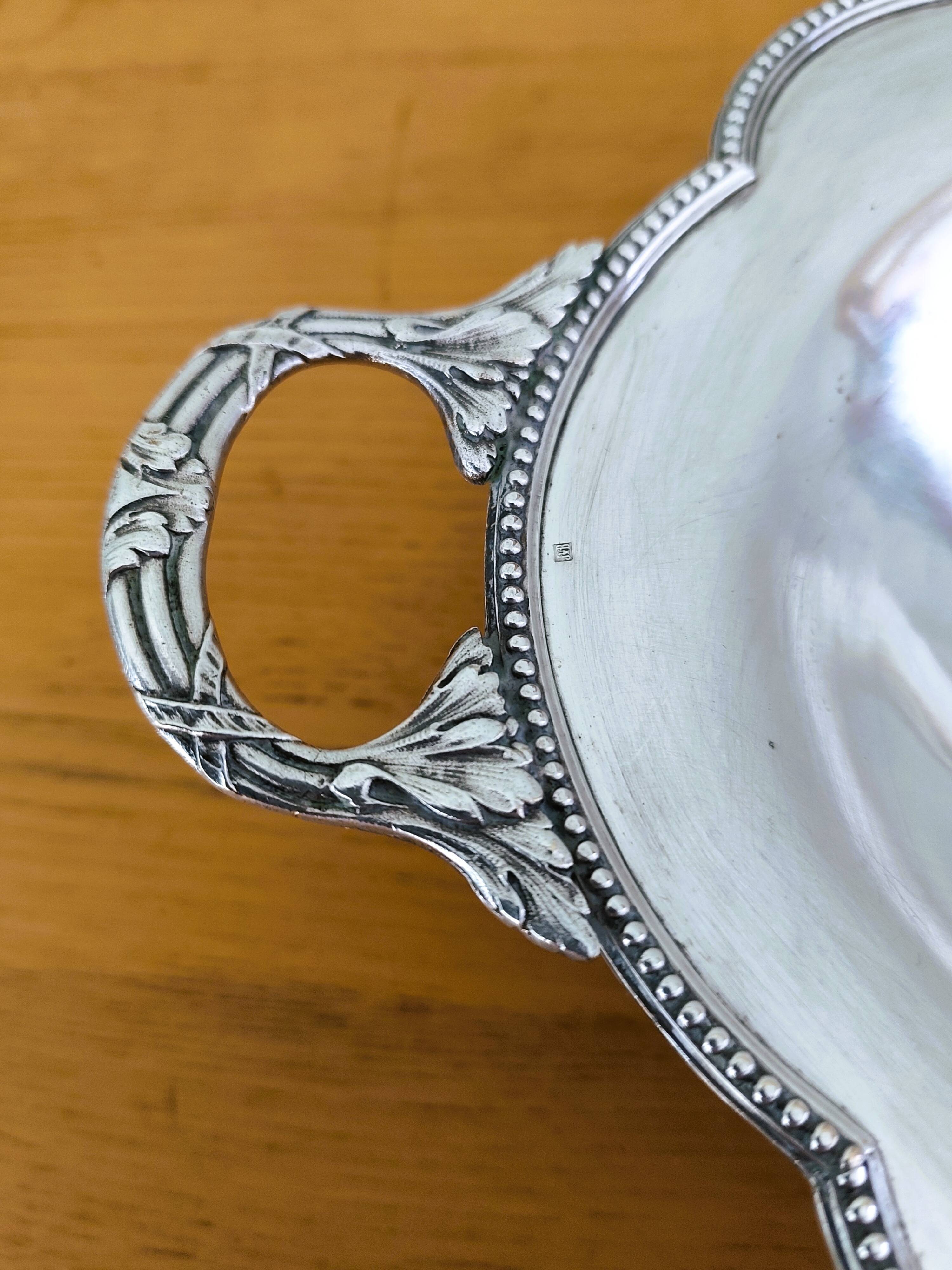 Antique silver-plated centrepiece with hallmark.