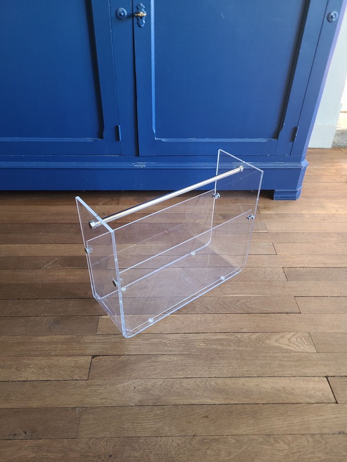 Plexiglass magazine holder by David Lange