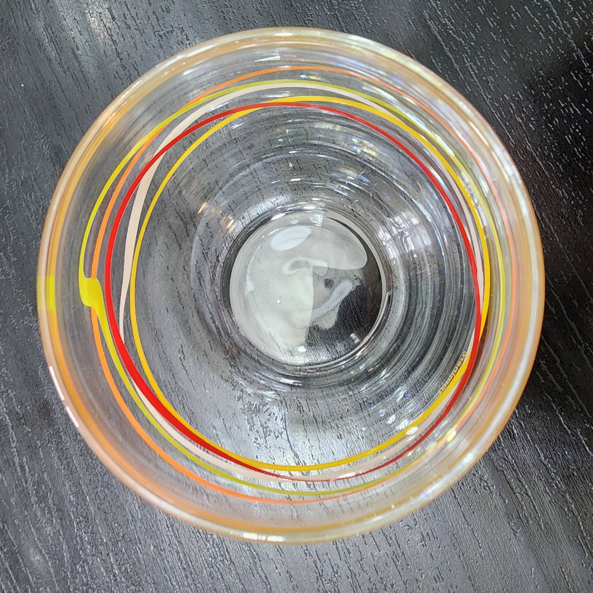 4 vintage Luminarc water glasses with coloured spiral line patterns.