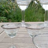11 bottle-bottom bistro glasses with silver edging, early 20th century