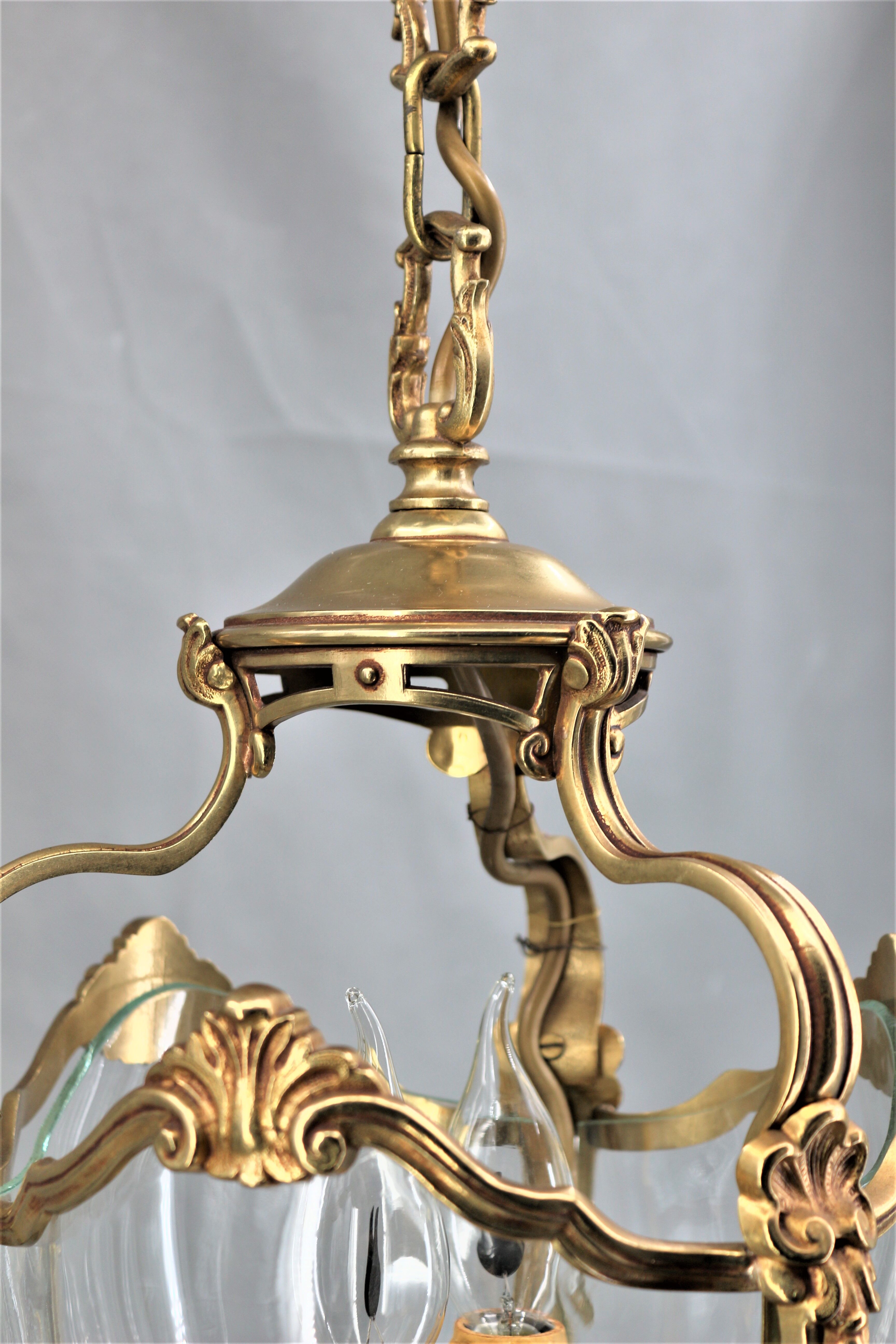 Lustre en bronze et verre bombé