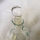 Bouteille d'huile en verre vintage