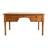 Large solid pine minister's desk with turned legs.