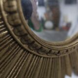 Vintage 1970s convex witch's eye sunburst mirror