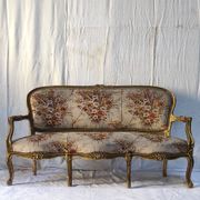 Three-seater canapé in carved wood, upholstery and gilded wood. Around 1900, Louis XV style.