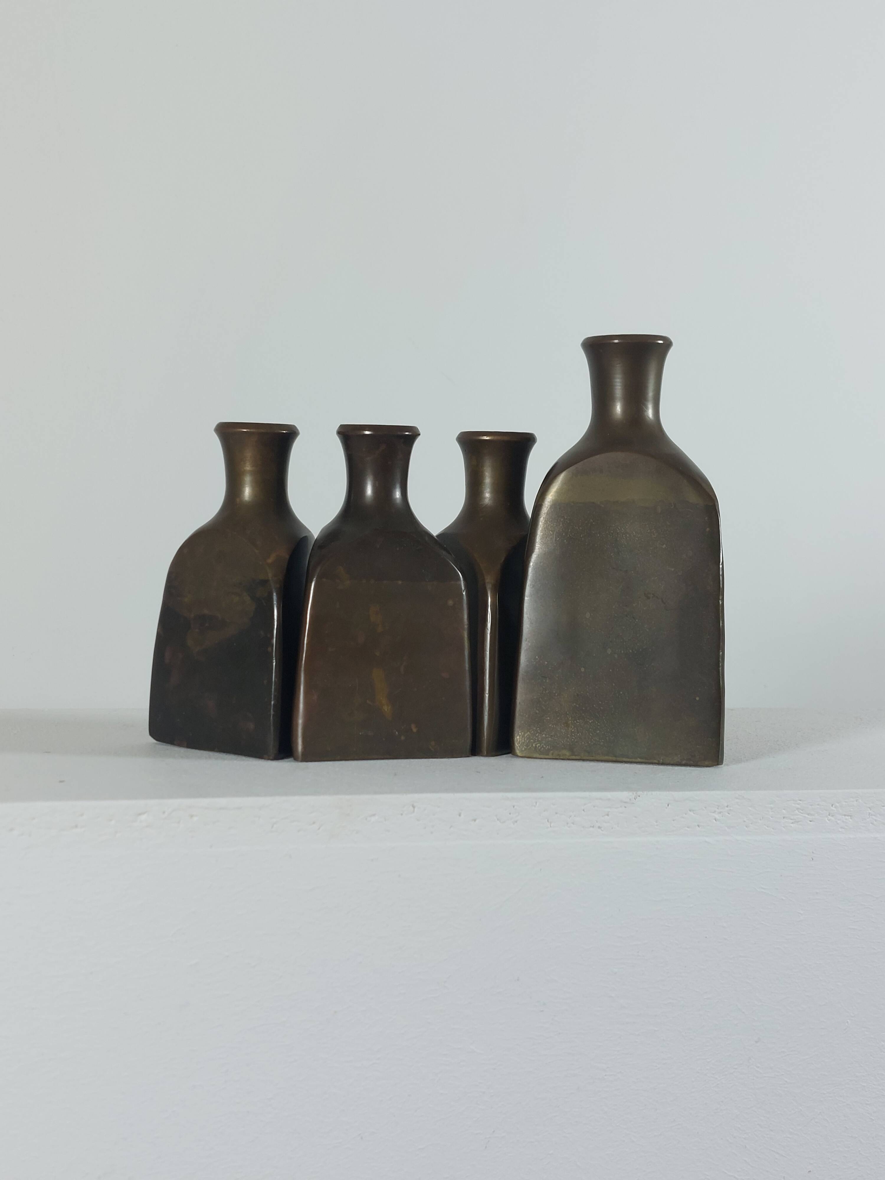 Vintage mid century Set of four triangular brass vases