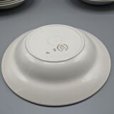 12 hollow porcelain plates, floral decoration and golden ledé - ∅: 23cm