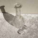 Old carafe in worked glass