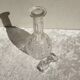 Old carafe in worked glass