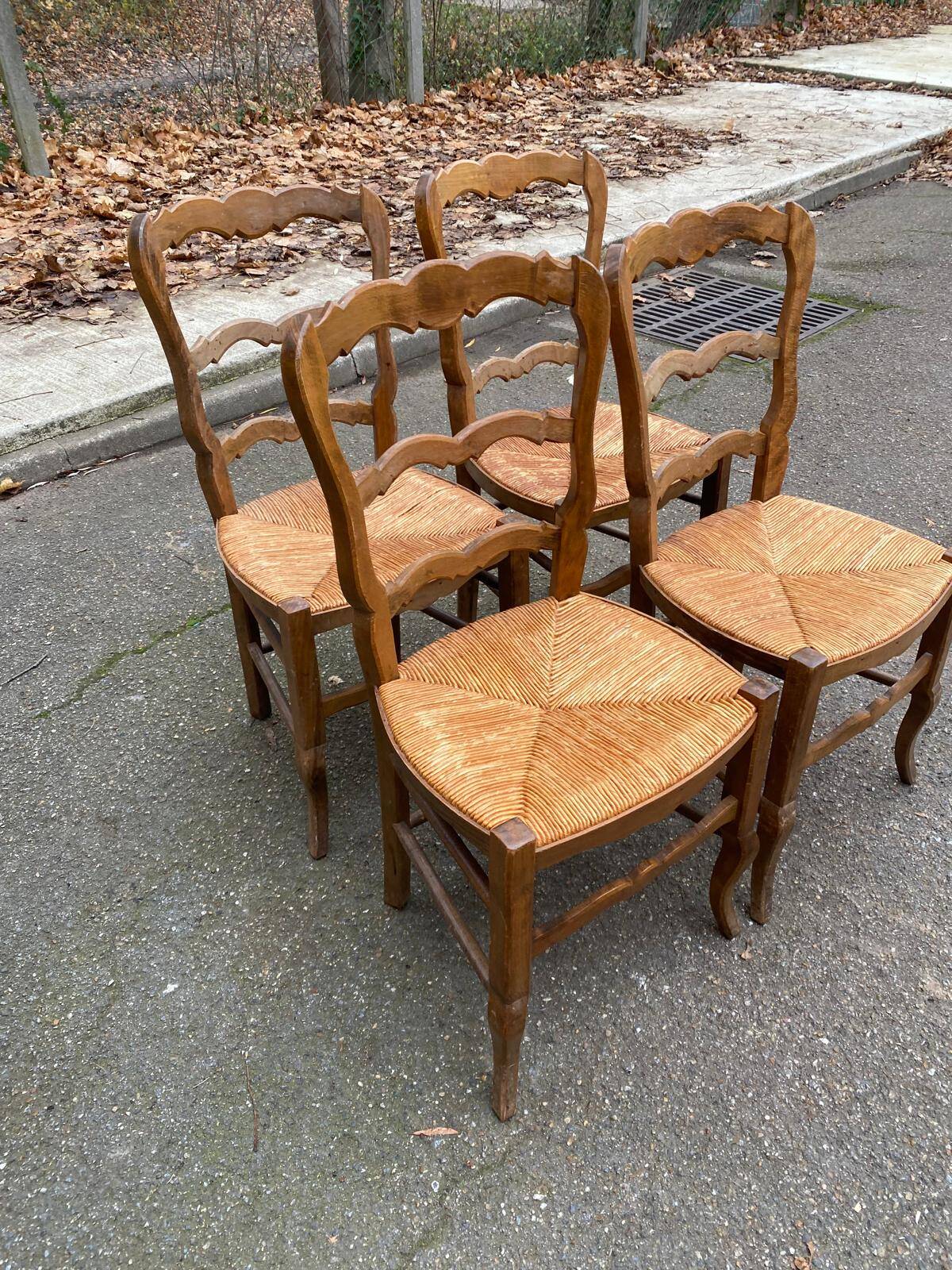 Four Louis XV chairs in solid oak and straw seats, 19th century