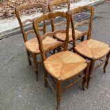 Four Louis XV chairs in solid oak and straw seats, 19th century