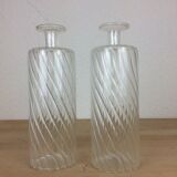 Pair of twisted glass bathroom bottle bottles