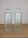 Pair of twisted glass bathroom bottle bottles