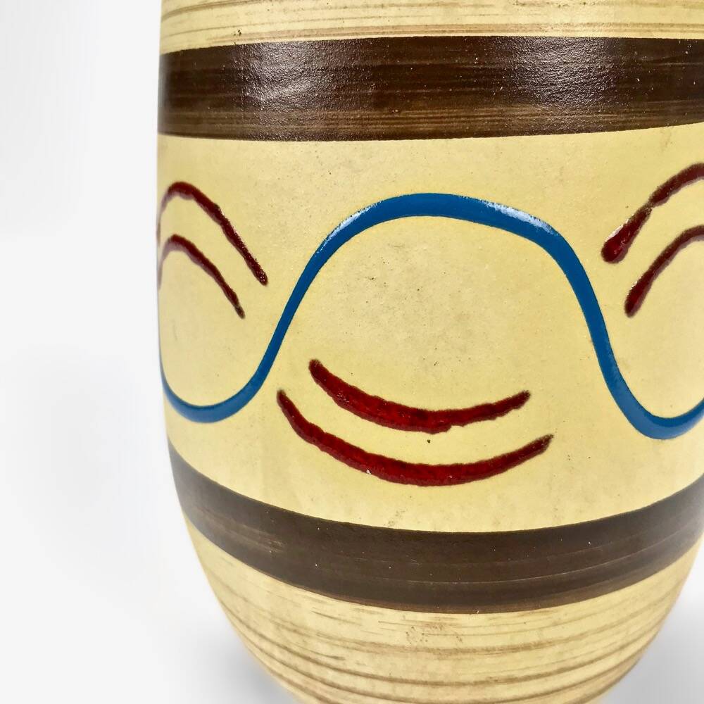 Ethnic trendy striated ivory vase from the 60s