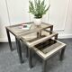 Smoked glass nesting coffee table