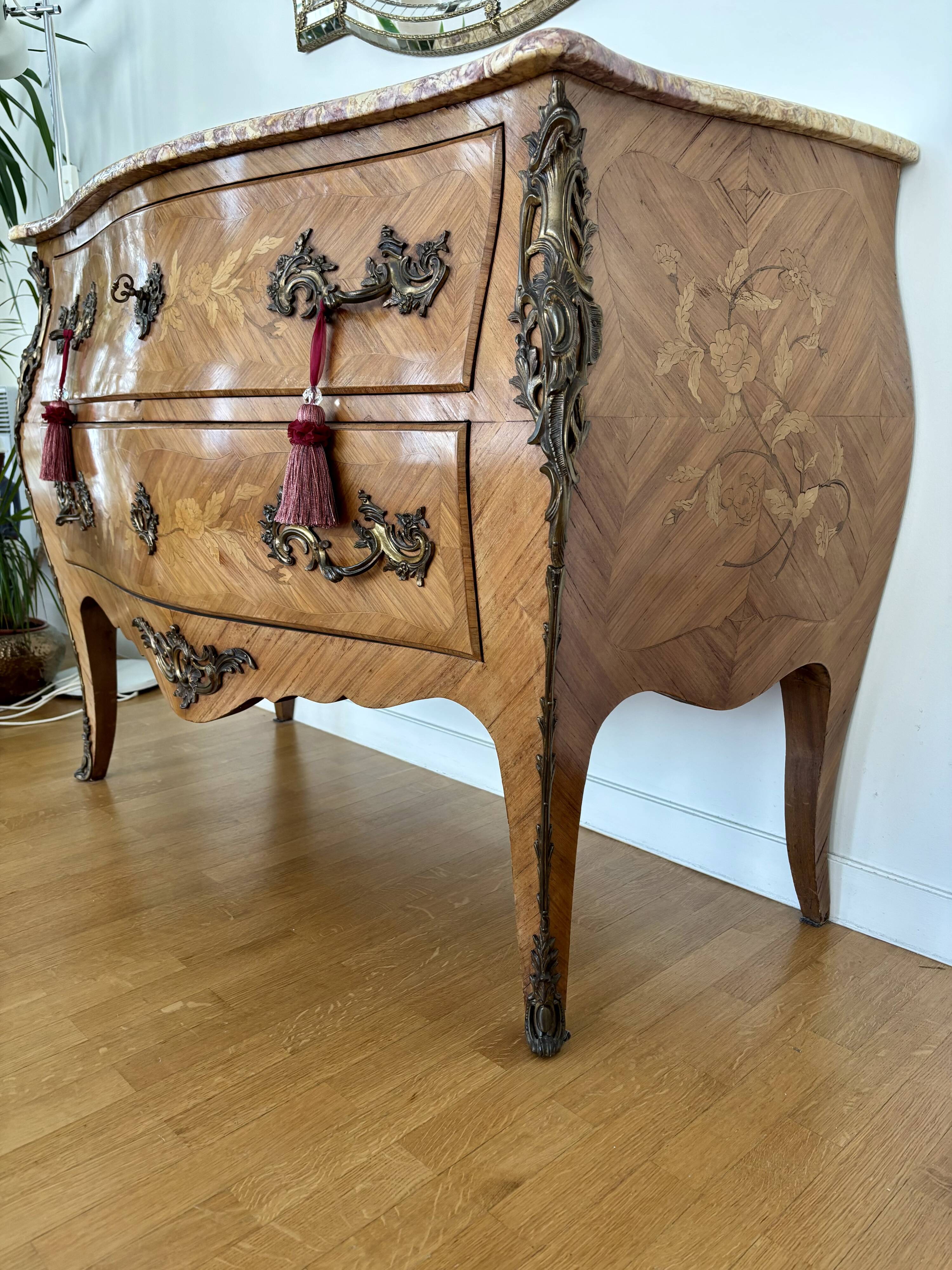 Louis XV style curved chest of drawers with floral marquetry and marble top