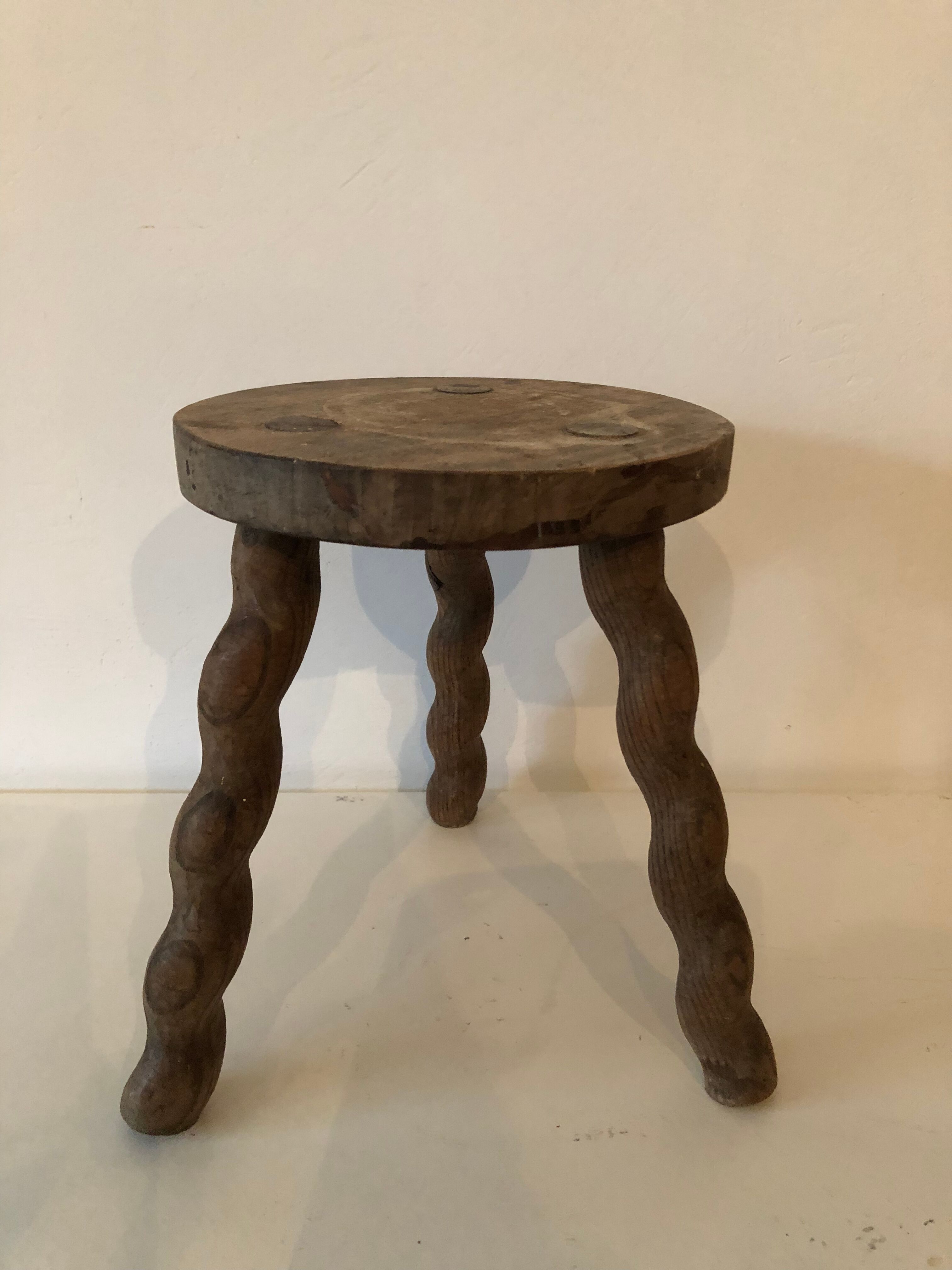Former tripod stool