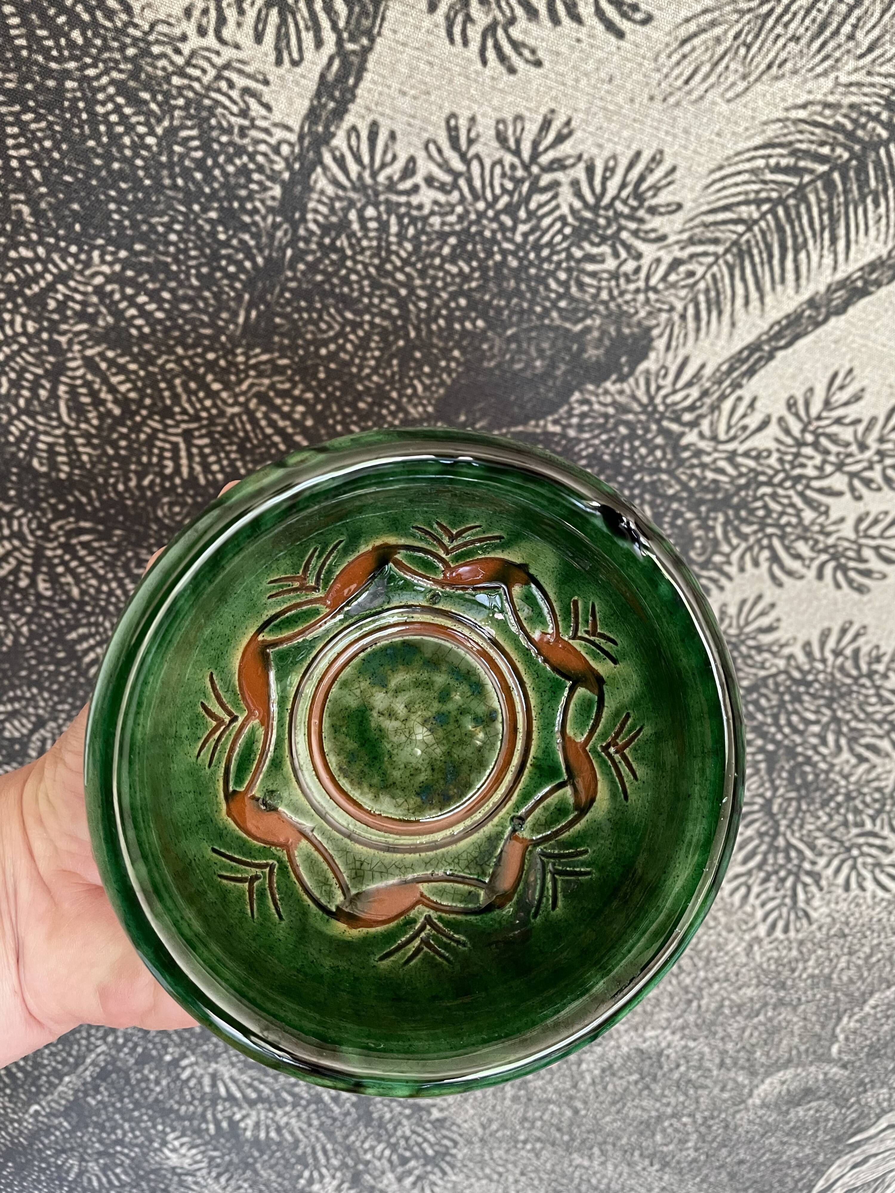 Green enamelled bowls from Ubeda
