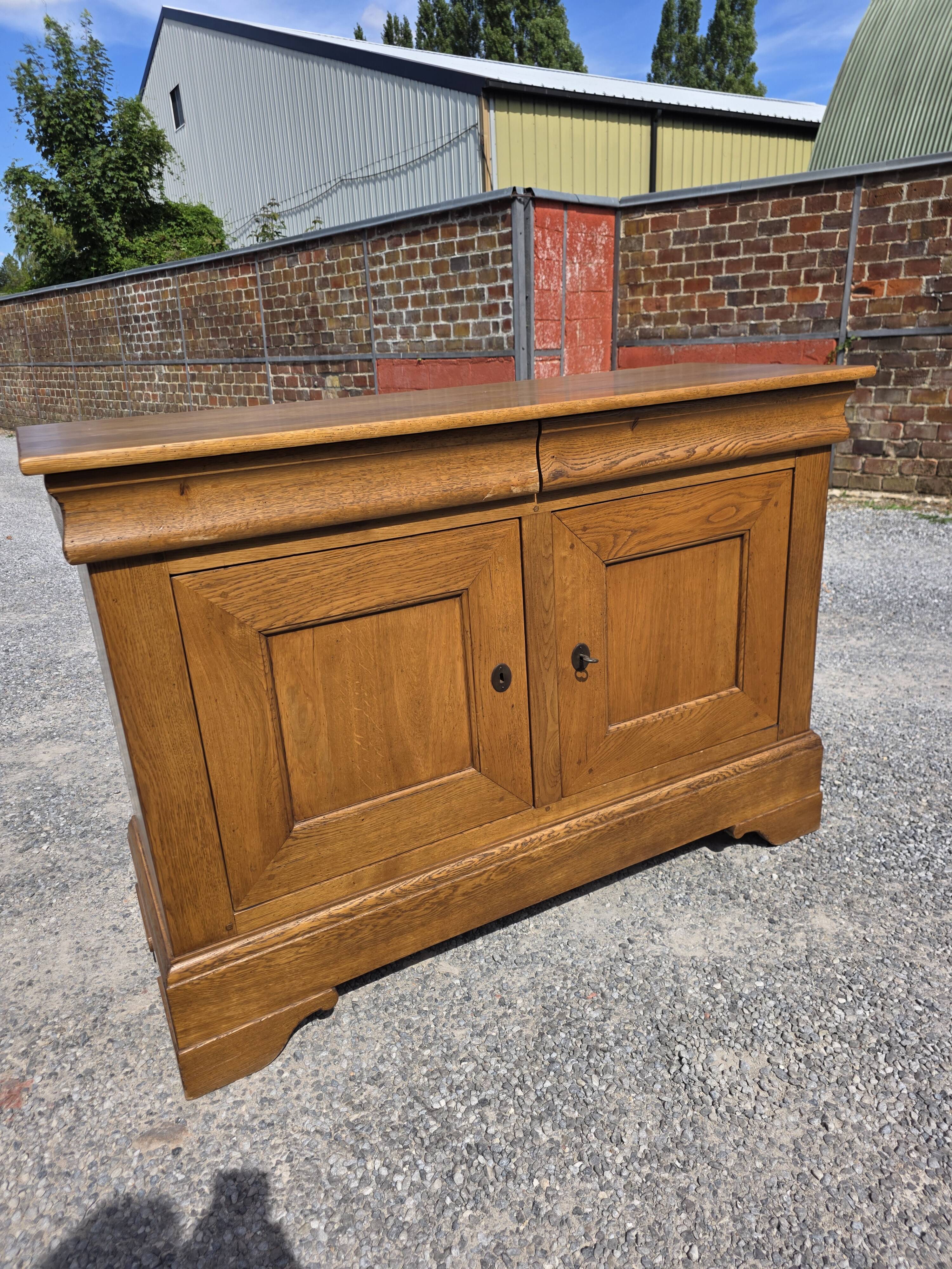 Louis Philippe buffet in solid oak.
