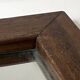Brutalist rectangular wall mirror in solid wood, France 1950.