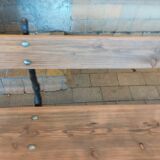 Antique garden bench with cast iron legs