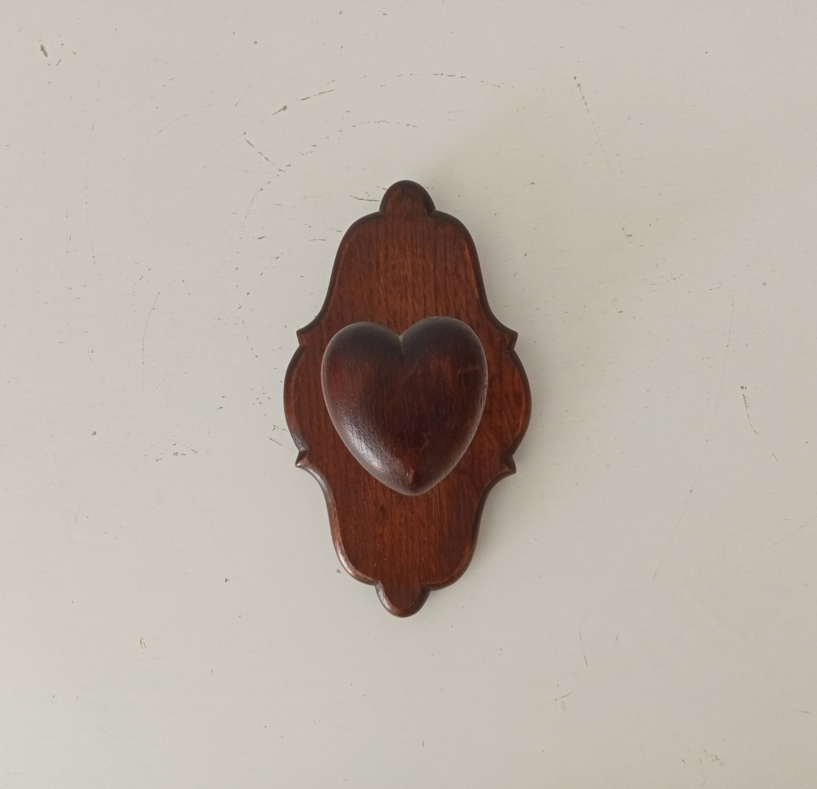 Vintage wall coat rack in carved solid wood, popular art.