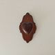 Vintage wall coat rack in carved solid wood, popular art.