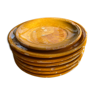 7 plates in Biot glazed earth