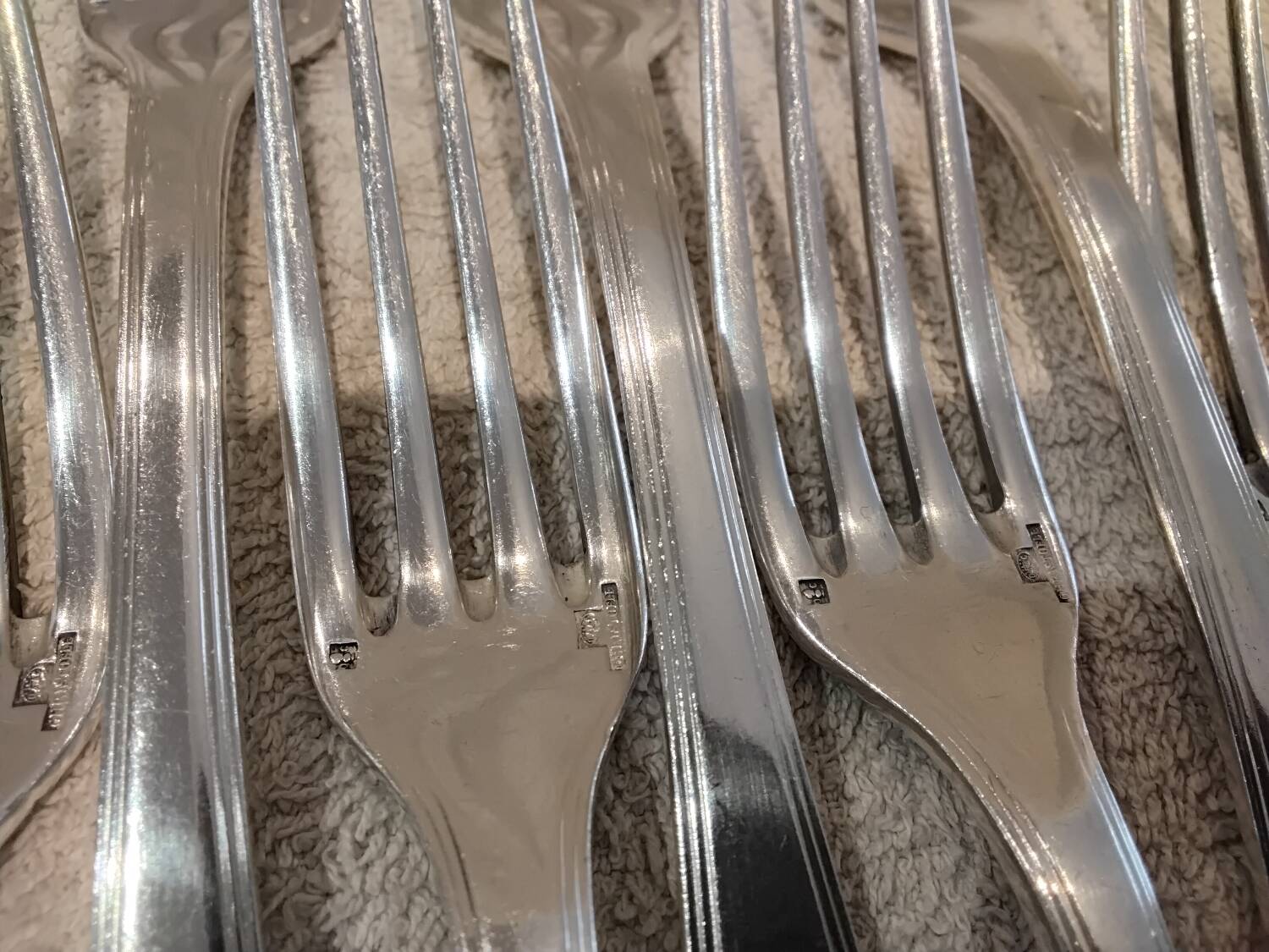 12 silver-plated table forks by Christofle America
