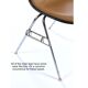 6 chaises empilables Eames de Herman Miller avec des coussins en naugahyde marron.