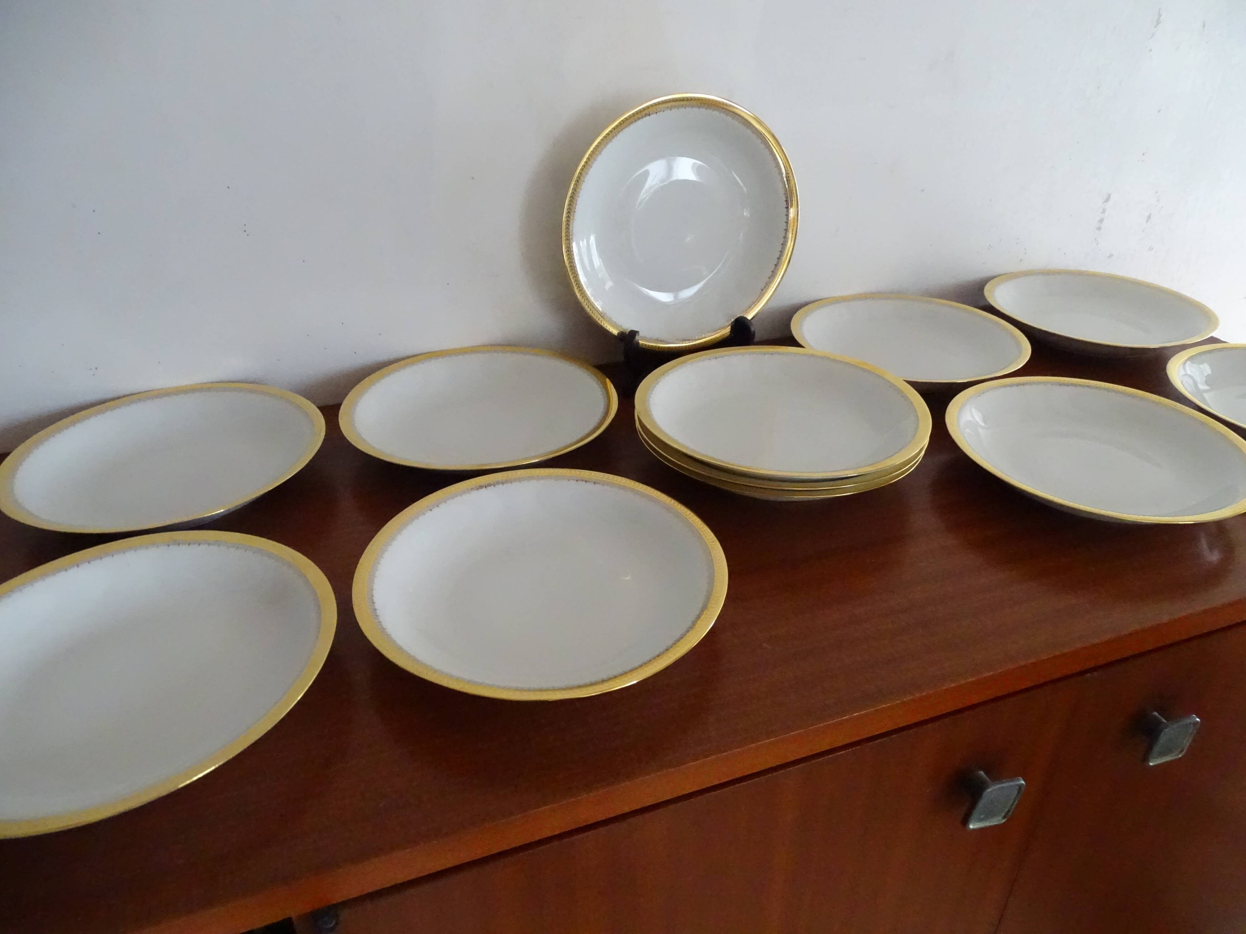 12 hollow plates porcelain of Sologne Larchevèque white and golden signed