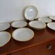 12 hollow plates porcelain of Sologne Larchevèque white and golden signed