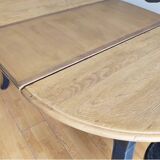Antique extendable round table with Louis XV style extension