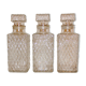 Three carafes for whiskey