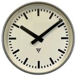 Grey industrial factory wall clock from pragotron, 1960s