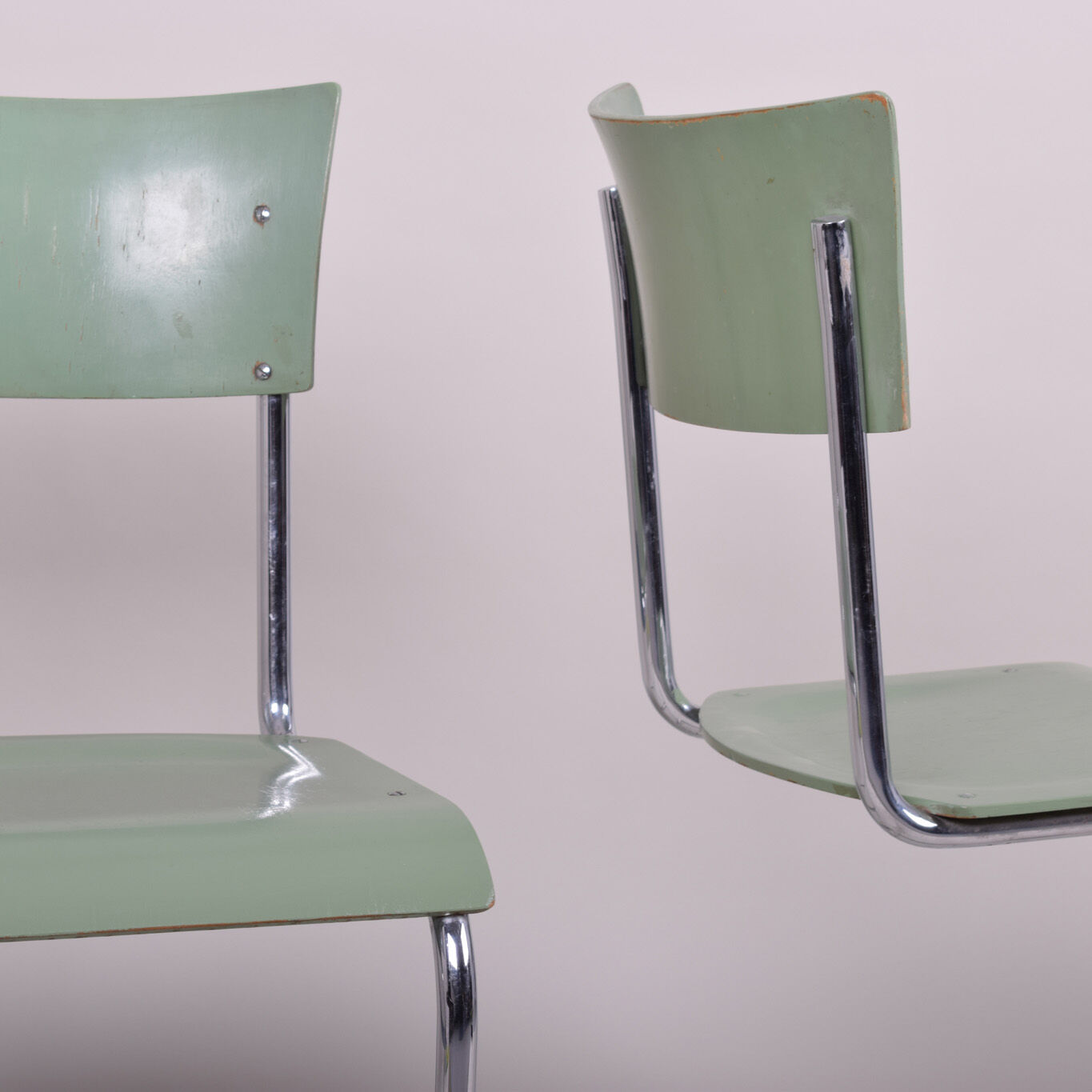 Pair of green Bauhaus chairs made in 1930s Czechia. Made by Robert Slezák