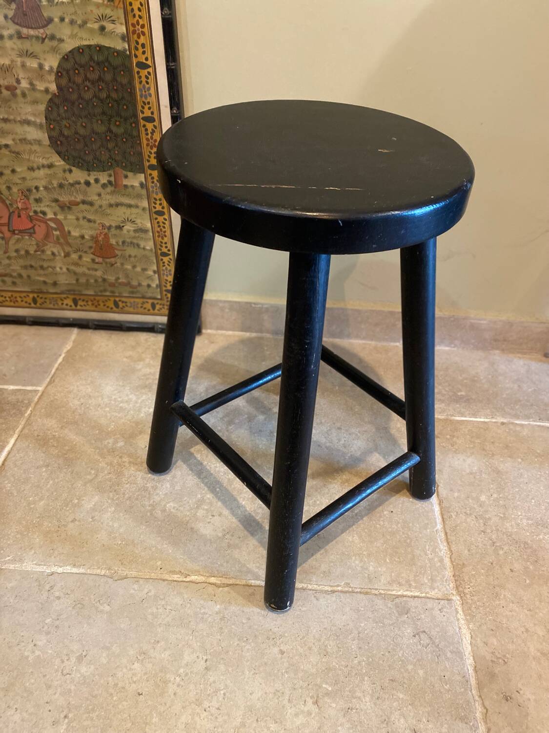 Black wooden stool