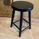 Black wooden stool
