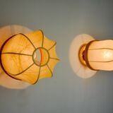 Pair of "cocoon" wall lights, resin and pine, Italy, 1970