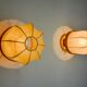 Pair of "cocoon" wall lights, resin and pine, Italy, 1970